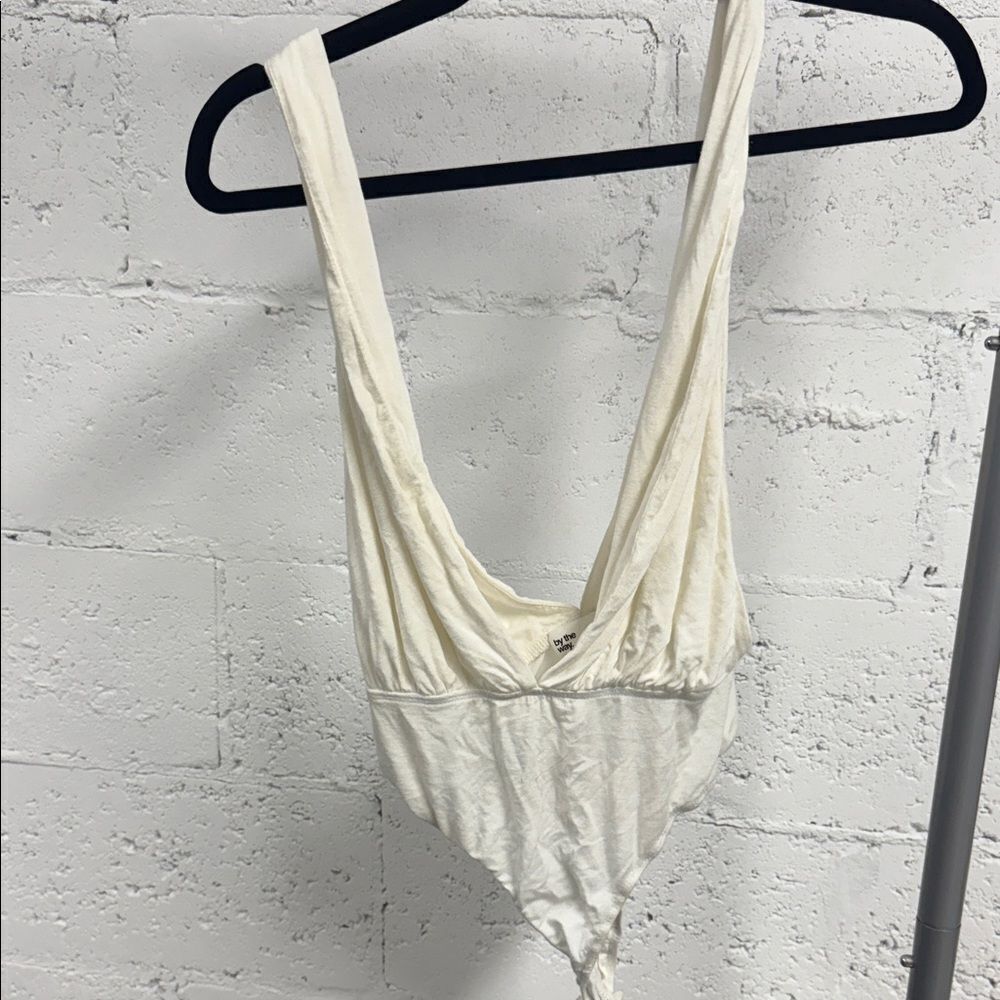 by the way. Cream Low Cut Body Suit, Low Cut Sides - Size XS